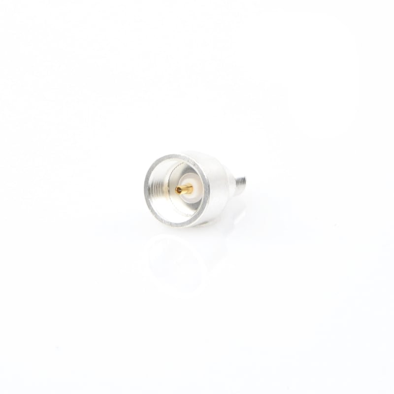 Adaptador UNIDAPT Hembra a SMA Hembra Inverso. Plata / Oro / Teflón. PT-4000-134